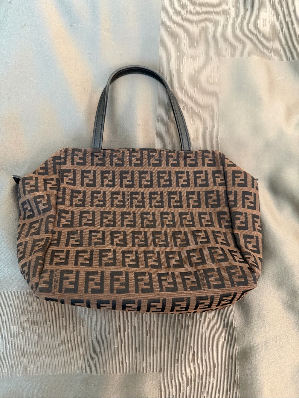 Fendi Monogram Zip top handle satchel Silver hardware. COA included.